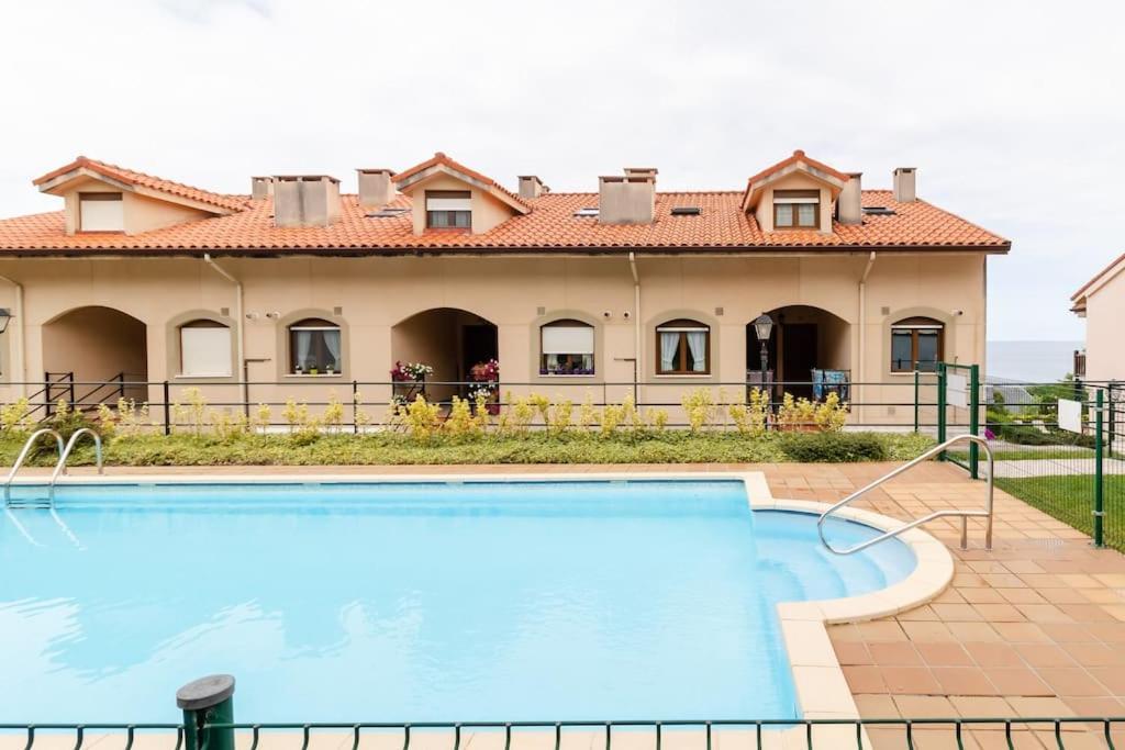 Casa De Las Flores - Apartamento Con Jardin Privado Frente A La Playa De Comillas Exterior photo